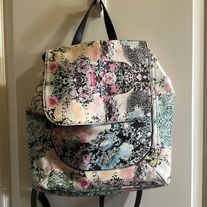 Multi color backpack. Pu leather and lining is cotton.
